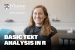 Headshot of a person smiling in a room with a Wharton University of Pennsylvania AI & Analytics logo, and the text "Basic Text Analysis in R".